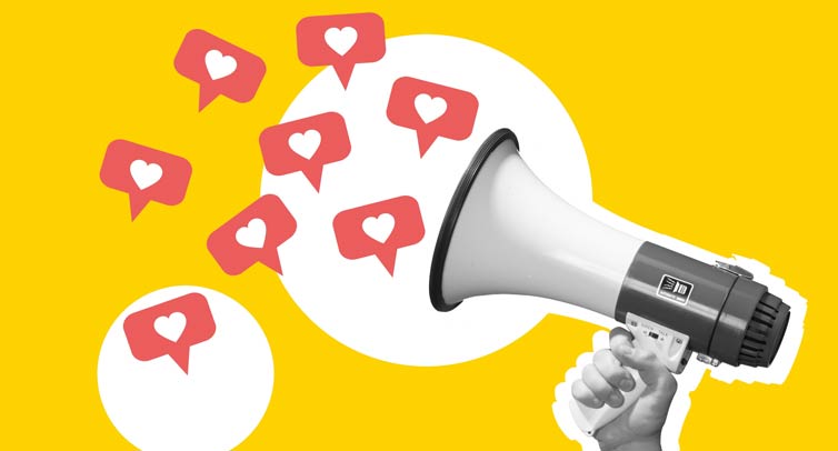 Megaphone “shouting out” text-message icons with hearts.